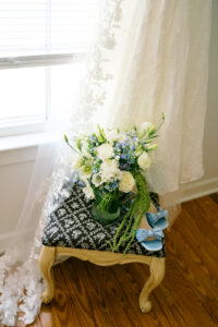 the bride's dress, shoes, and bouquet