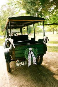 a vintage car transporting the guests at the venue
