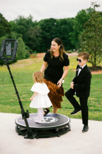 A family taking a 360 photo