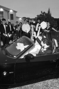 the couple leaving in their exit car